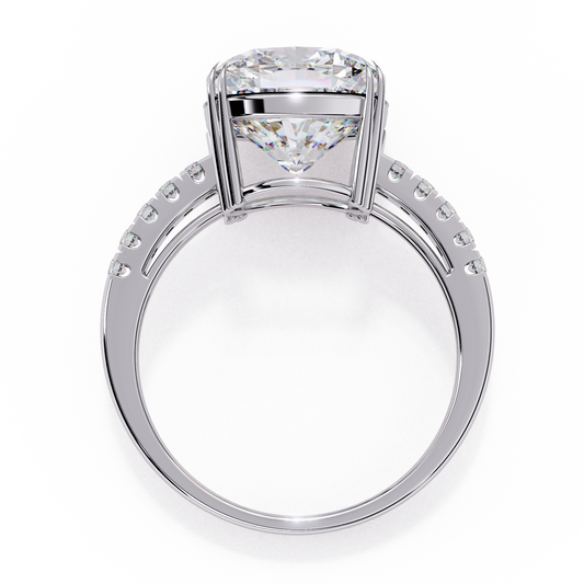 Three stone radiant cut lab grown diamond engagement ring under view showing setting structure yellow gold